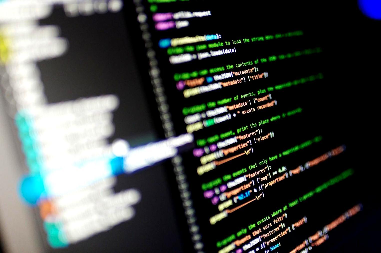 Blockchain data analysis workspace showing multiple monitoring screens